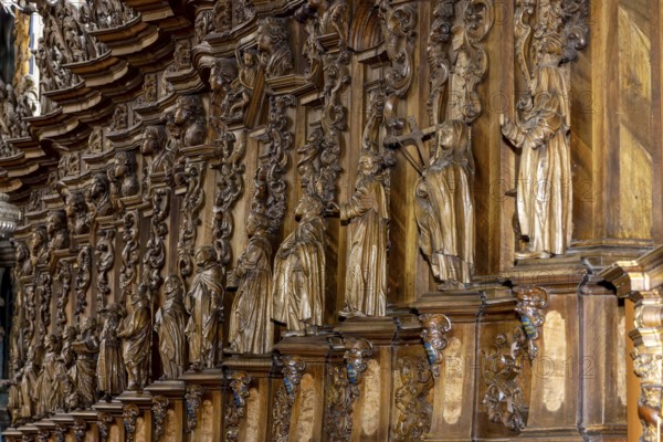 Carved walnut figures and choir stalls, Catholic parish church of St Magnus, Schussenried Monastery, Bad Schussenried, Swabia, Baden-Württemberg, Germany
