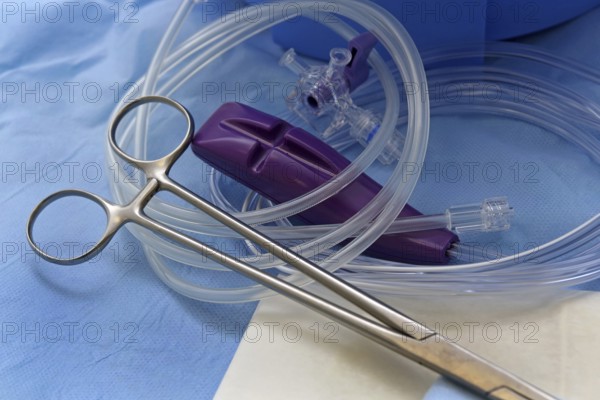 Grain tongs, three-way stopcock, medical tubing