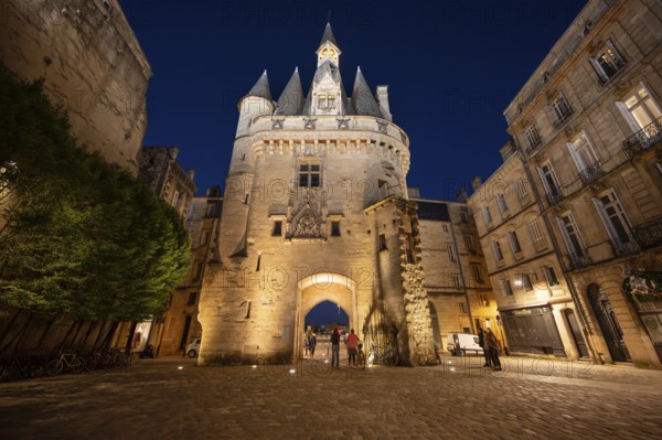 Night view of the Porte Cailhau or Porte du Palais. The former town gate of the city of Bordeaux in France. One of the main touristic attractions of the French city. High quality photography