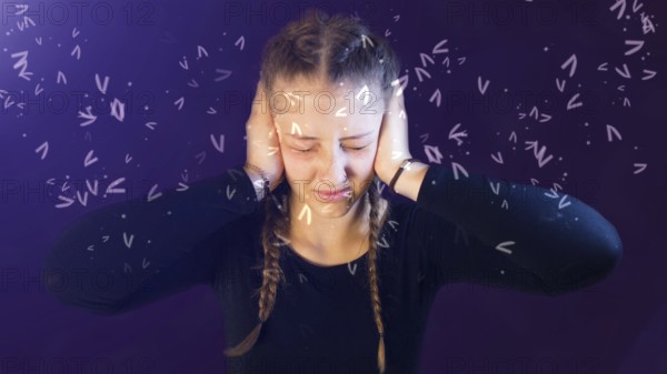 Teenage girl dressed casual with pigtails, being attacked by social media, creating emotional stress, bullying
