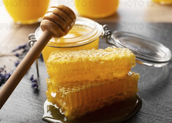 Honeycomb on slate tray on kitchen table closeup, food photography, food photography