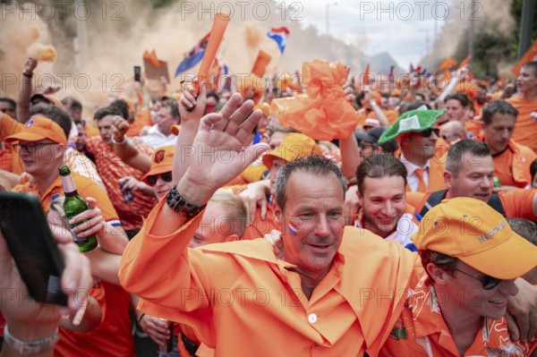 06/07/2024, Berlin, Germany, Europe, Fans of the Dutch national football team celebrate on a fan walk in front of the quarter-final match against Turkey during the European Football Championship UEFA EURO 2024