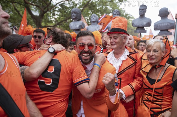 06/07/2024, Berlin, Germany, Europe, Fans of the Dutch national football team celebrate on a fan walk in front of the quarter-final match against Turkey during the European Football Championship UEFA EURO 2024
