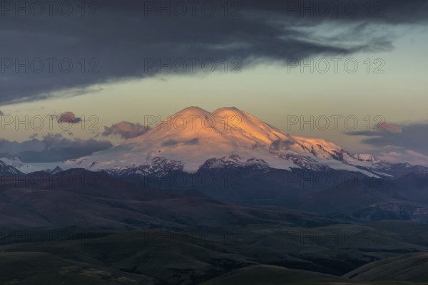 Beautiful view of Mount Elbrus at sunrise, North Caucasus mountains, Russia