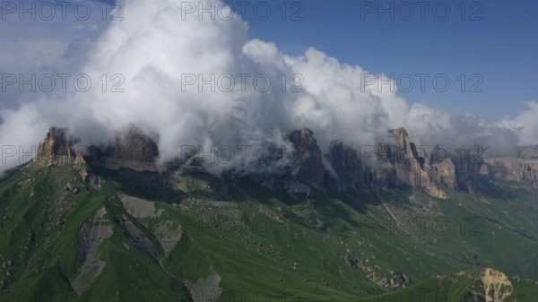 Aerial view on Caucasus mountains under epic clouds, Kabardino-Balkaria, Russia