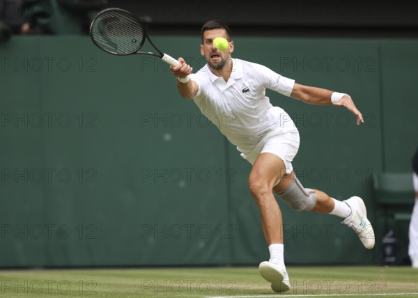 Serbian tennis player Novak Djokovic in action at the 2024 Wimbledon Championships, London, England, United Kingdom