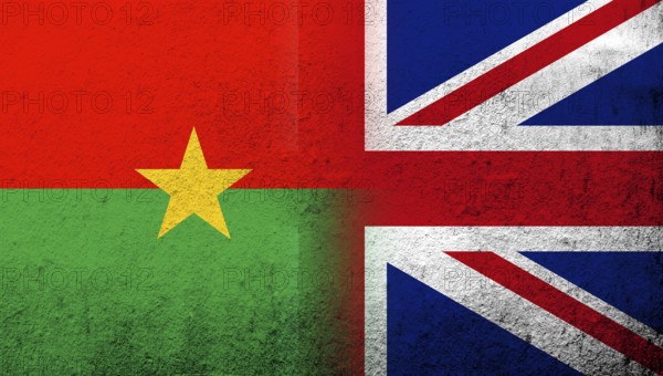 National flag of United Kingdom (Great Britain) Union Jack with National flag of Burkina Faso. Grunge background