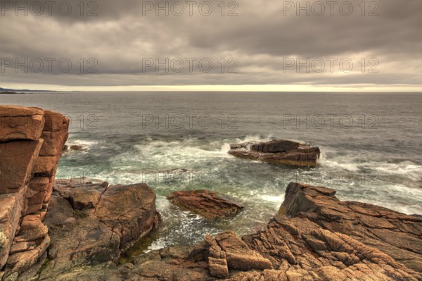 View of the rocky cliff shore line at Acadia National Park. Maine, New England, USA - HDR Image