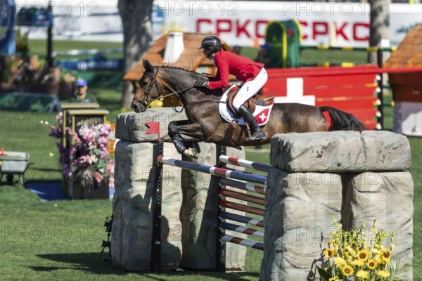 Martin Fuchs of Switzerland, riding Commissar Pezi competes in the BMO Nations Cup during the CSIO Spruce Meadows, Masters, in Calgary, Alberta, Canada, North America