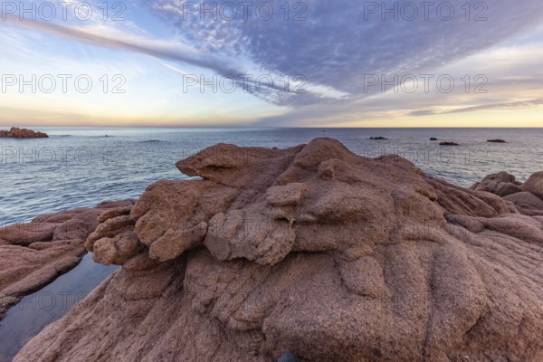 Coastal landscape with bizarre red rocks and sea view, Spiaggia di Cala E'Luas, Ogliastra, Sardinia, Italy