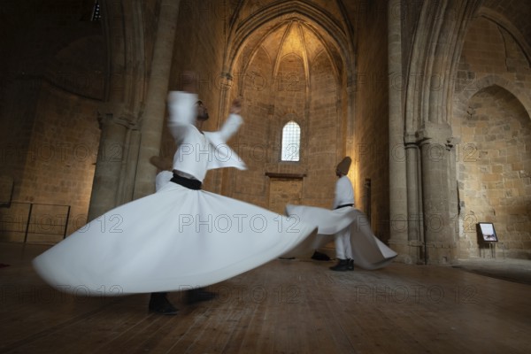 Nicosia, Cyprus, June 5 2019: Group of Dervishes performing the traditional and religious whirling dance or Sufi whirling