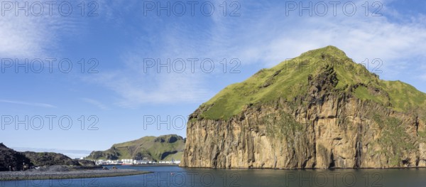 Harbour entrance to the harbour town of Heimaey, steep rocky cliffs, panoramic view, Westman Islands, Iceland