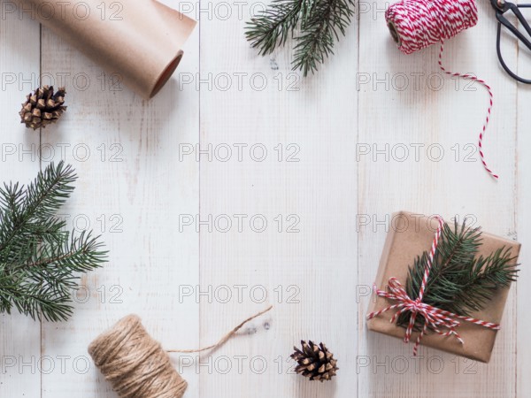 Christmas gift wrapping background, copy space for text or design in center. Winter holidays concept, flat lay or top view