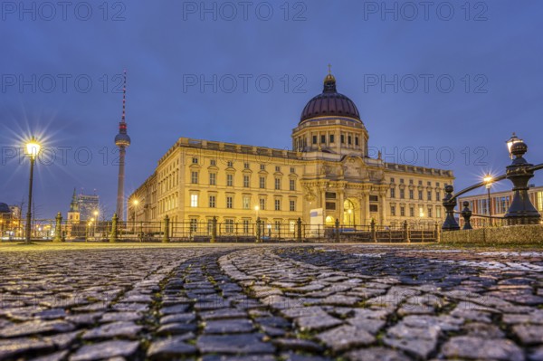 The Berlin City Palace at night, photographed from a low angle
