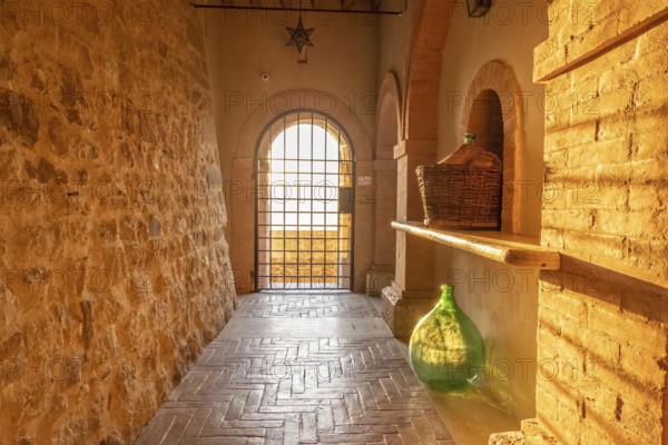 Beautiful sun light inside of an ancient castle near Montalcino, Tuscany, Italy. Old stone medieval castle