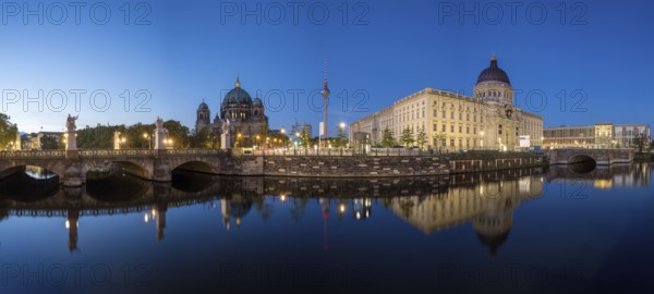 Panorama of Berlin Cathedral, the famous television tower and the rebuilt City Palace at night
