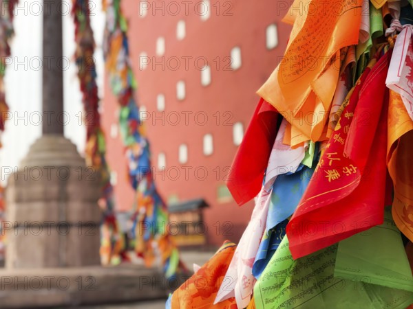 Buddhist color prayer flags at The Putuo Zongcheng Buddhist Temple, one of the Eight Outer Temples of Chengde, built in 1767 and modeled after the Potala Palace of Tibet. Chengde, China
