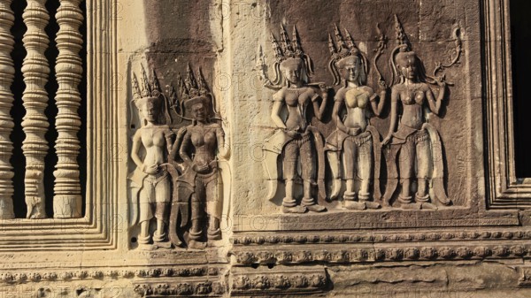 Apsaras half-human, half-divine woman of Hinduism and Buddhism at Angkor Wat in Cambodia