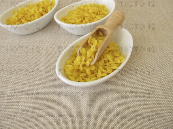 Pure beeswax pastilles for natural cosmetics, candles or beeswax wraps