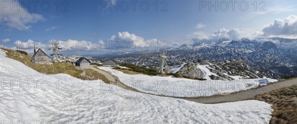 Amazing mountains panorama from 5 Fingers viewing platform in the shape of a hand with five fingers on Mount Krippenstein in the Dachstein Mountains of Upper Austria, Salzkammergut region, Austria
