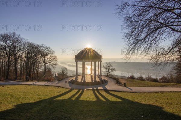 Beautiful temple in a landscape shot. Sunrise on a winter morning. Beautiful view along the Rhine at the Niederwaldtempel, Niederwalddenkmal, Hesse, Germany