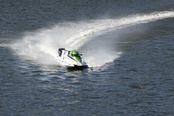 PESO DA REGUA, PORTUGAL - SEPTEMBER 15, 2024: White Powerboat Makes Turn with Splashes of Water during Race. Formula 2 World Championship