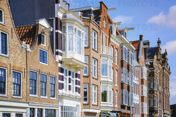 Buildings under the Cloudy Sky Amsterdam, Netherlands