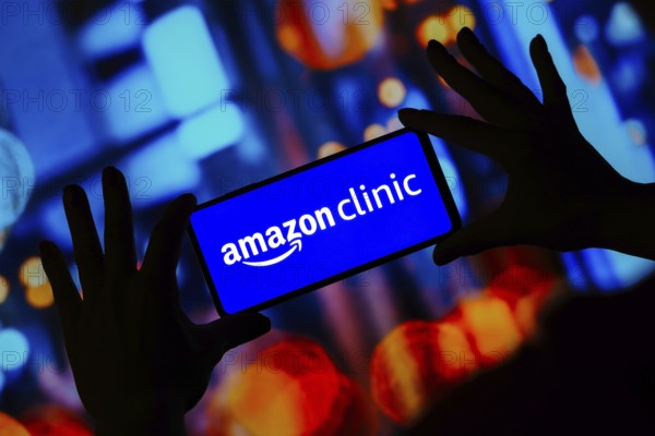 In this photo illustration, the Amazon Clinic logo seen displayed on a smartphone
