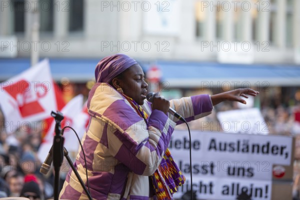 Alliance against right-wing extremism mobilised under the motto Never again is NOW! Nuremberg Kornmarkt 8 Feb 25 Singer Ki'luanda provides musical accompaniment