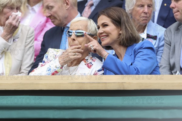 Martina Navratilova and her partner Julia Lemigova watching the action at the 2024 Wimbledon Championships, London, England, United Kingdom