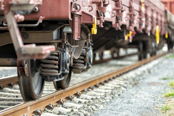 Goods train with goods wagons at a marshalling yard in Europe