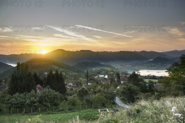 Shoot of sunrise in national park Tara in Serbia, with sun flares, clouds and fog in the shot