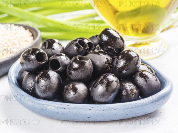 Black olives in blue plate