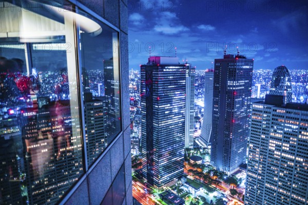 Tokyo night view seen from the observation deck of the Tokyo Metropolitan Government Building. Shooting Location: Tokyo metropolitan area