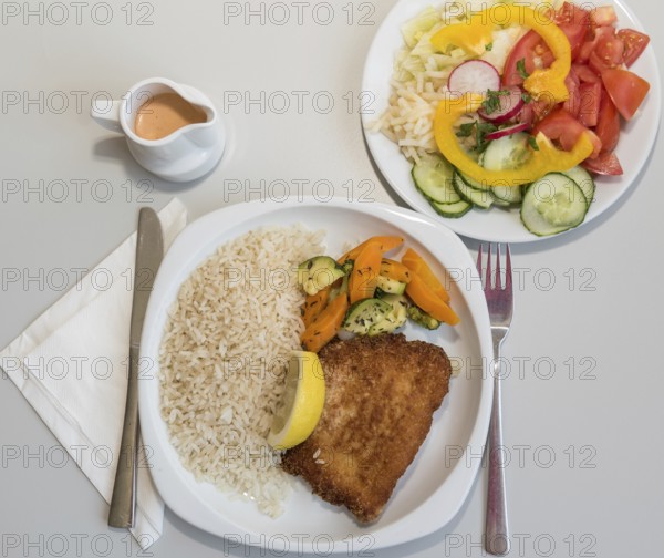 Cordon bleu filled with cheese and ham with salad - Schnitzel, bird's eye view