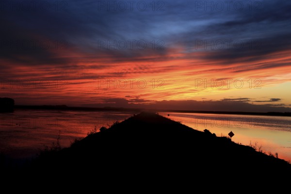 Prairie Sunset lake and road in Canada