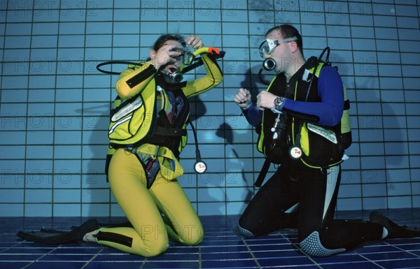 Diving training in the swimming pool, Mask blowing, Germany, Munich, Olympiabad