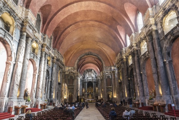 Lisbon, Portugal, 12 28 2018: Symmetrical interior design of the Roman Catholic Baroque church of Sao Domingos