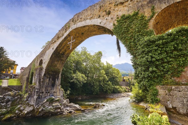 Cangas de Onis roman bridge on Sella river in Asturias of Spain