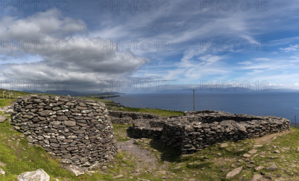 Fahan, Ireland, 5 August, 2022: view of the Fahan beehive huts on the Dingle Peninsula in County Kerry of western Ireland