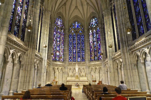 Saint Patrick's Old Cathedral or Old St. Patrick's, Lower Manhattan, Gothic nave with high windows, colourful glass decorations and prayer benches, Manhattan, New York City, New York, USA, North America