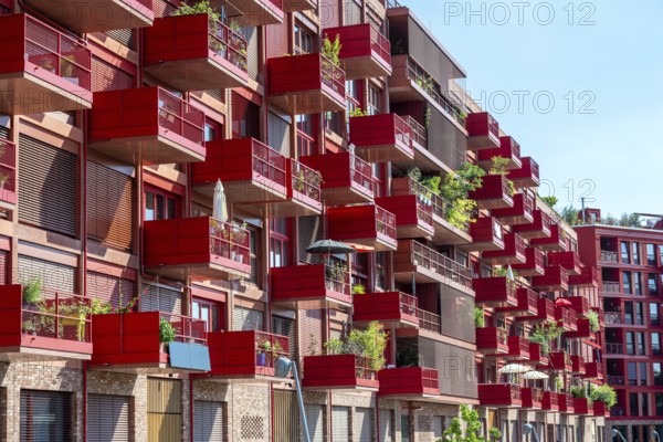 Red modern apartment block in Berlin, Germany