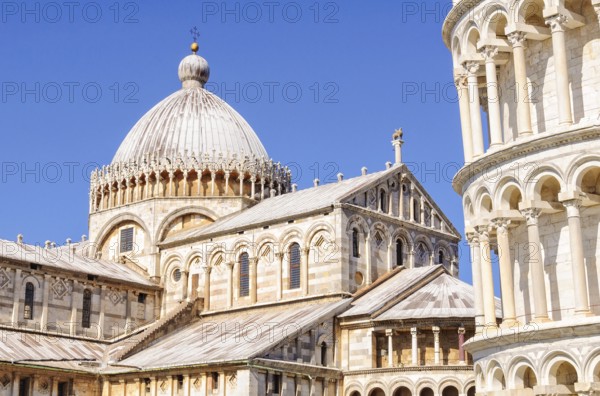 Leaning Tower (Torre Pendente) and the Cathedral (Duomo) with the Greek Cross on its dome and the bronze hippogriff on its roof, Pisa, Tuscany, Italy