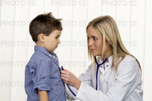 Doctor and little boy, symbol for diseases, diagnostics, heart defects