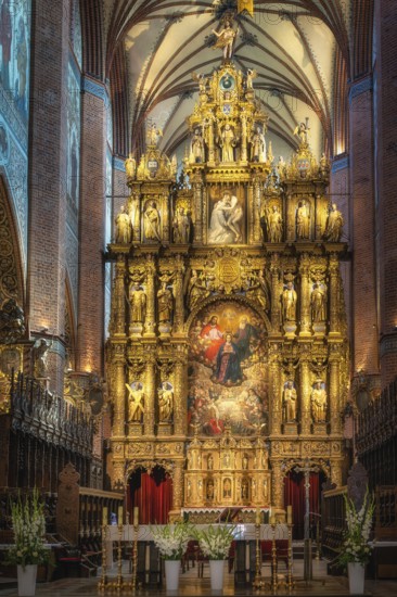 Closeup on amazing, golden and ornate altar of Church of the Assumption of the Blessed Virgin Mary, Cathedral Basilica in Pelplin, Poland