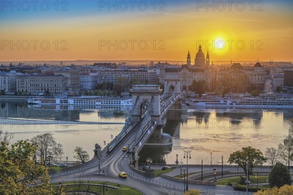 Budapest Hungary, city skyline sunrise at Danube River with Chain Bridge and St. Stephen's Basilica