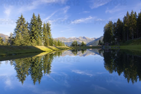 The lake on the top above alpine village of Alpbach and the Alpbachtal (Alpbach valley), Austria