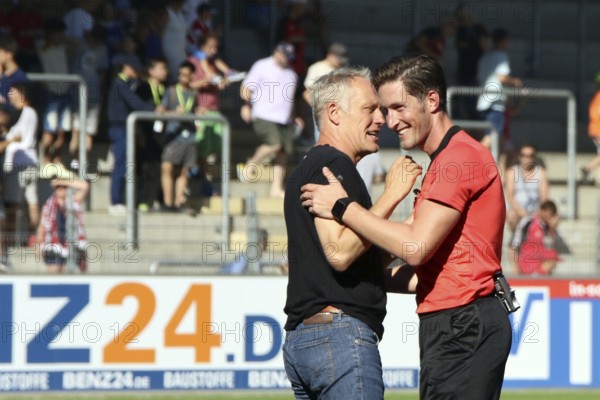 Coach Christian Streich (SC Freiburg) and referee Matthias Jöllenbeck (SV Weilertal during the test match, SC Freiburg, Real Sociedad San Sebastian