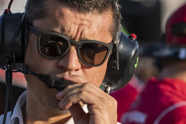 NTT INDYCAR SERIES team owner, RICARDO JUNCOS, watches as his teams prepare for the Bommarito Automotive Group 500 at World Wide Technology Raceway in Madison, IL