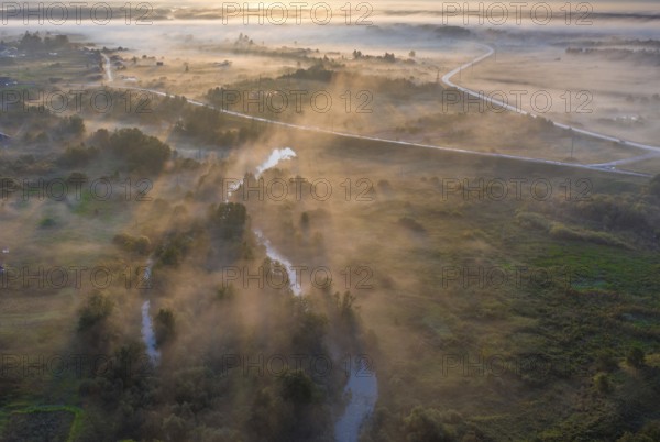 Sunset aerial atmospheric view on river in Ural Russia. Drone photography